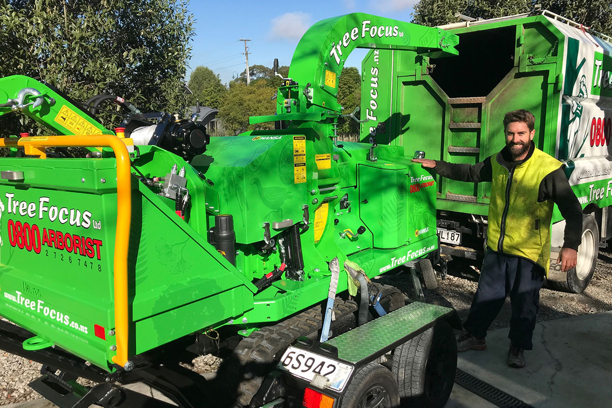 A Tree Focus team member with our specialist chipper