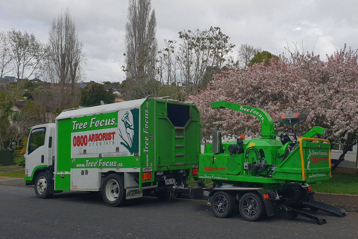 Original Tree Focus branded truck and chipper